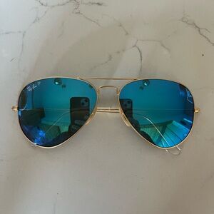 Ray Ban mirrored Aviator sunglasses.